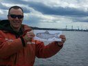 Jason and Flat Alewife deploying an acoustic telemetry receiver in the Kennebec River Estuary